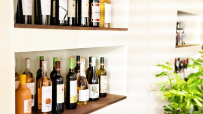 wine bottles on a shelf