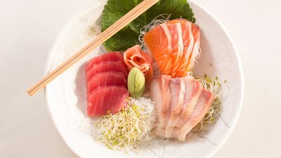 Plate of raw fish and bean sprouts