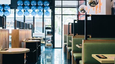 Well lit restaurant interior during the day