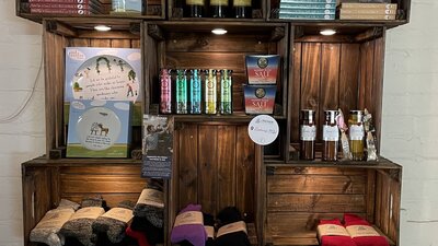 Goods on shelves for sale at Merino Cafe in Gunning