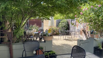 Courtyard with tables and chairs at Merino Café, Gunning.