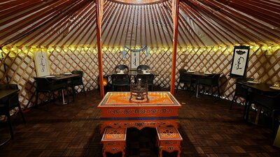 Inside of the Yurt(Ger) fully set for dine in