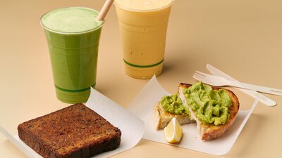 Oliver's banana bread and avocado on sourdough, with green smoothie and mango smoothie