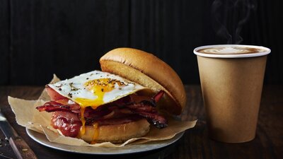 Our signature breakfast combo - Bacon & Egg Roll and coffee