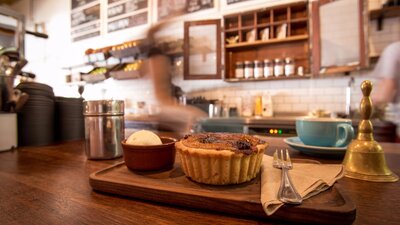 Cake and ice cream ready to be taken to a table