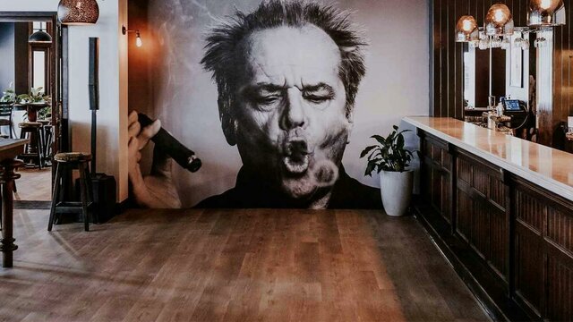 PJs back bar decor PJs back room bar with picture of Jack Nicholson