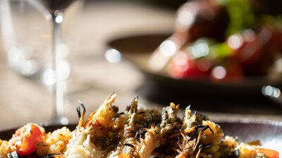 A delicious dinner with wine glasses on the table