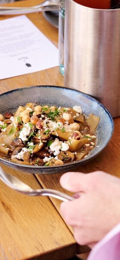 pappardelle with mushrooms, chevre & hazelnuts