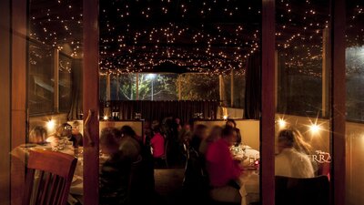 Romantic evening lighting over diners