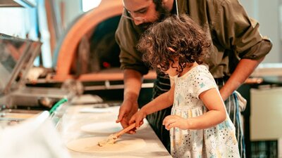 Teaching my little niece how to make pizza