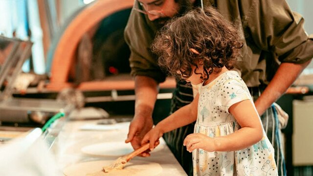 Teaching my little niece how to make pizza