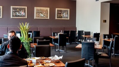 View of dining room with diners inside