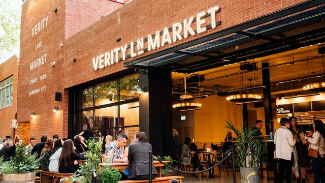 Verity Lane Market back deck Outdoor deck with people sitting at bar tables
