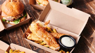 Fish and chips in takeaway containers