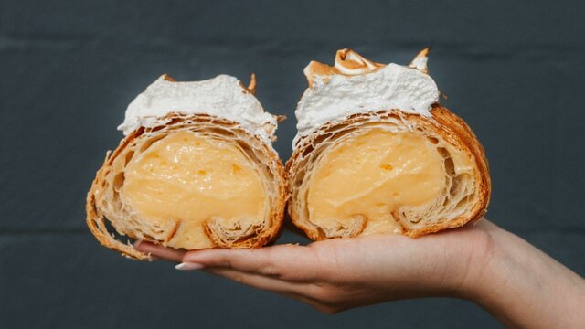 Wildflour Canberra pastry being held in the air at Wildflour Canberra