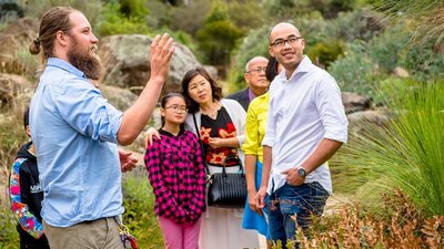 Garden's Ranger with international visitors