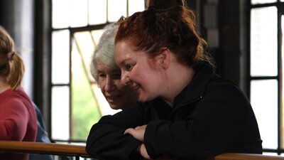 Visitors watching glass blowing