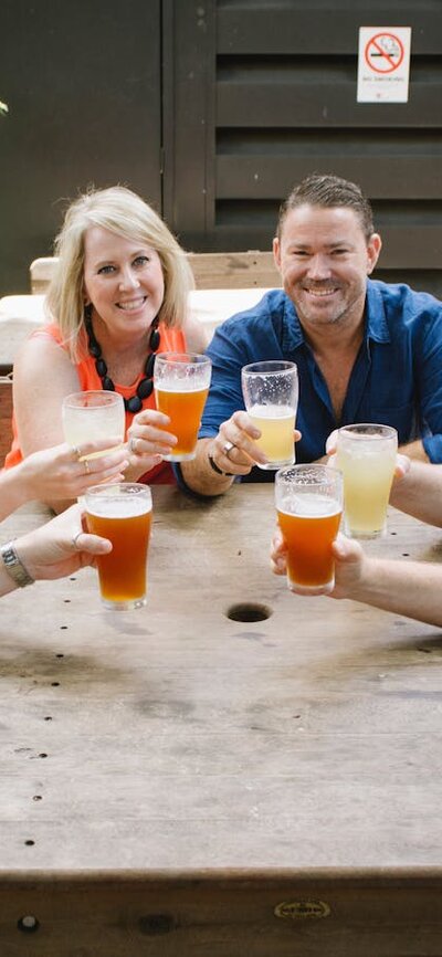 Tour participants with a cold beer