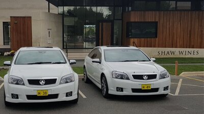 Shaw Wines is a popular destination for discerning clients Shaw wines exterior wit two vehicles from Executive Driving Service