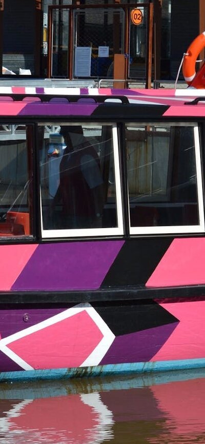 Brightly coloured boat on the water