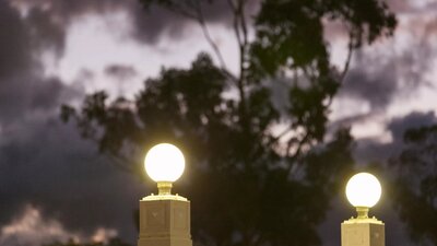 Light globes against a night sky