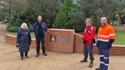 Rotarians at English Garden wall