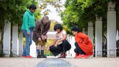 Tour group visits Centenary of Women's Suffrage Fountain