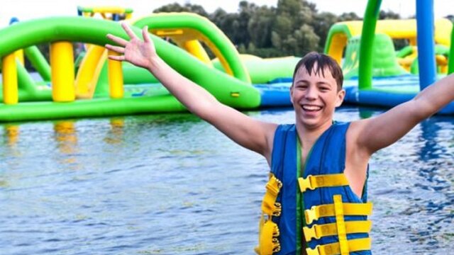Image of a young boy in a life jacket at Canberra Aqua Park.