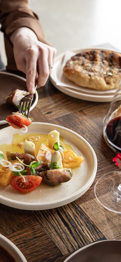Modern Australian food dishes plated on a table