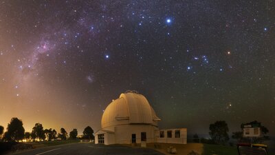 Stars shining at night at an observatory