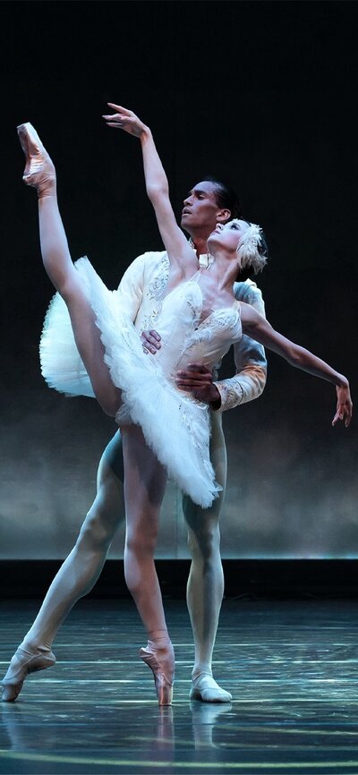 A man and woman performing on stage