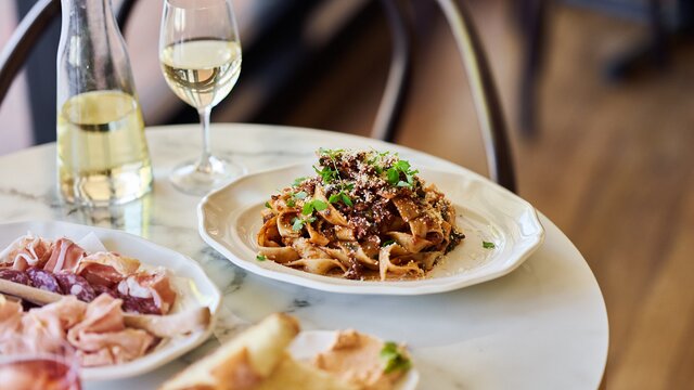 Italian dishes and wine on a table