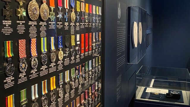 A display of Australian honours and awards medals at an exhibition