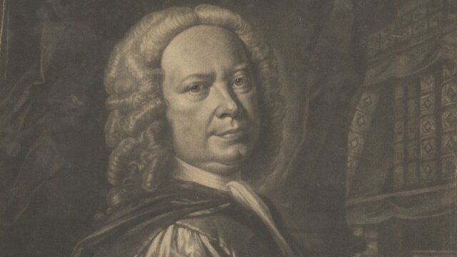 A grayscale portrait of a man