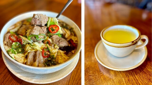 A Filipino beef dish and a lemon tea in a mug