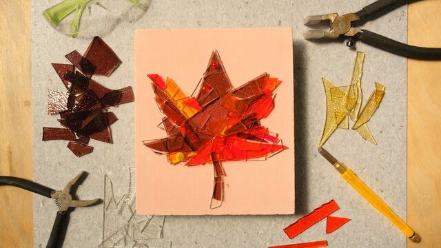 Glass tiles shaped in an autumn leaf design