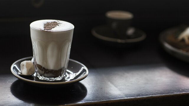 A hot chocolate in a cup and saucer