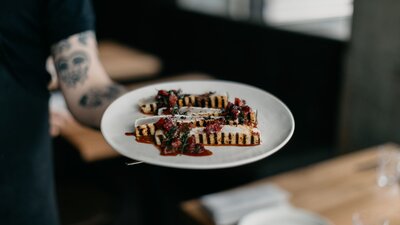 A plate of food being served at Rebel Rebel, an eatery in NewActon.