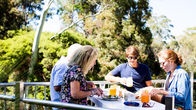 Patrons eating at an outdoor venue