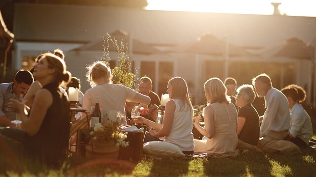 A group of friends enjoying a picnic outdoors at Poachers Pantry.