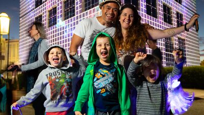 A family standing outside the Questacon building.