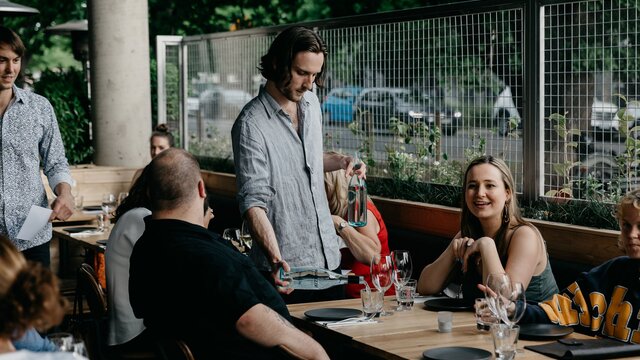 A group of friends dining at Rizla, a restaurant in Braddon.
