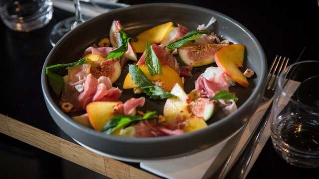A dish consisting of figs and smoked meats served at eightysix in Braddon.