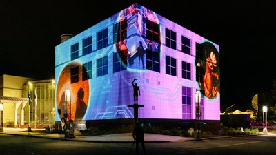Illuminations projected on the Questacon building