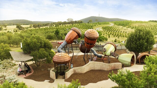 Pod Playground | © Wunderman Thompson Aerial image of the Pod Playground at the National Arboretum Canberra with the arboretum and Black Mountain Tower in the background. | © Wunderman Thompson