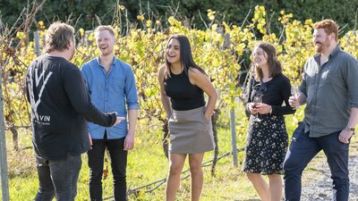 A group of friends on a winery tour